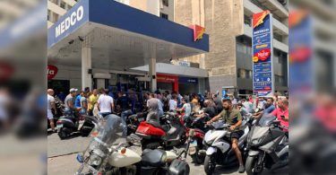 The Lebanese government raised fuel prices in the midst of violence and roadblocks