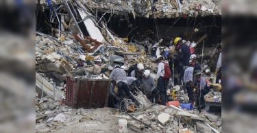 Four bodies found in condominium debris; At least 16 dead