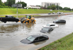 Residents of Detroit - Frustrated Areas Clean the Flood House