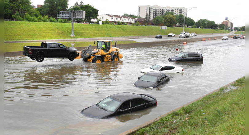 Residents of Detroit - Frustrated Areas Clean the Flood House