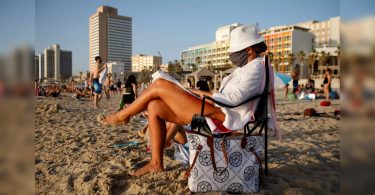 Israel resumes indoor mask requirement amid virus spike