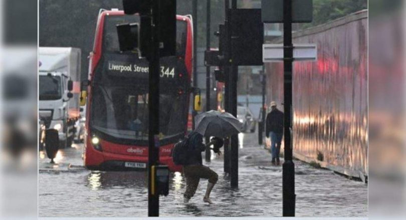 London Cleaning After Flash Flooding Drenches Homes, Subway