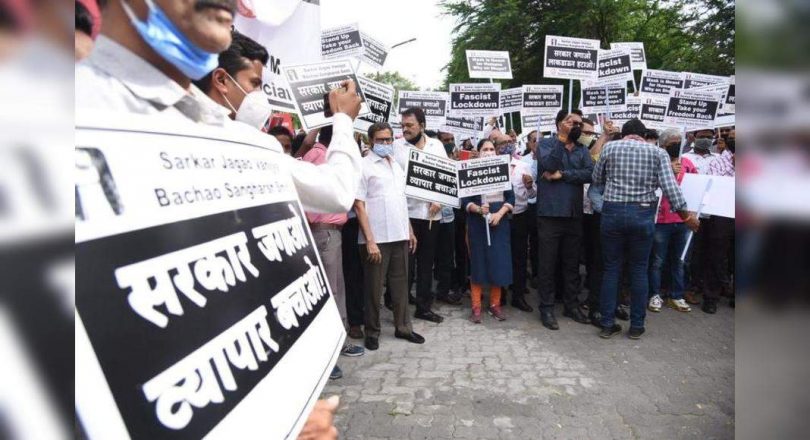 Wages to pittance, workers join the boss in protest to lift the sidewalk