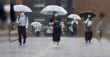 Tropical storms make landings in North Japan