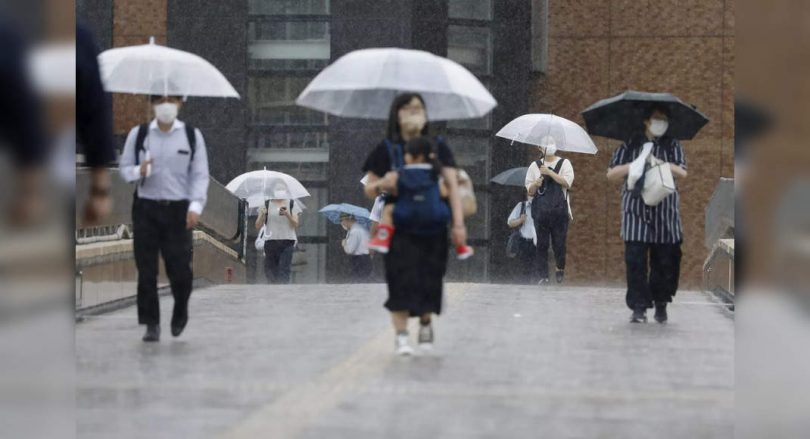 Tropical storms make landings in North Japan