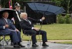 UK PM Johnson's Umbrella Mishap Amus Prince Charles