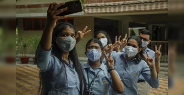 Smile after tense waiting for the results in Covid