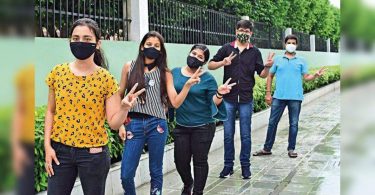 Smile after tense waiting for the results in Covid