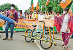 Land cycle at Scrapyard, BJP Stage Protest in Bhubaneswar