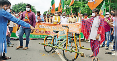 Land cycle at Scrapyard, BJP Stage Protest in Bhubaneswar