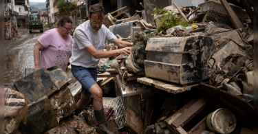 In a flooded German city, a priest struggled to provide comfort