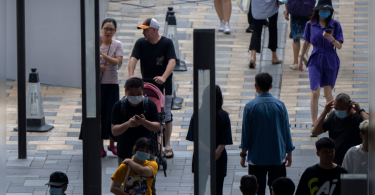 Chinese prosecutor was charged with accusing a plot to intimidate residents to return to China