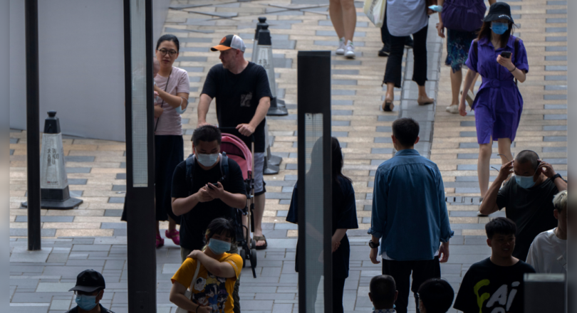 Chinese prosecutor was charged with accusing a plot to intimidate residents to return to China