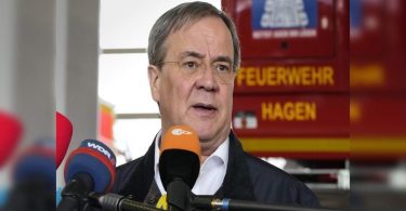 German candidate sorry for the laughing scene during a flood visit