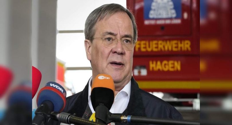 German candidate sorry for the laughing scene during a flood visit