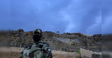 Pilgrims gather to Mount Arafat at the high point of the Hajj era