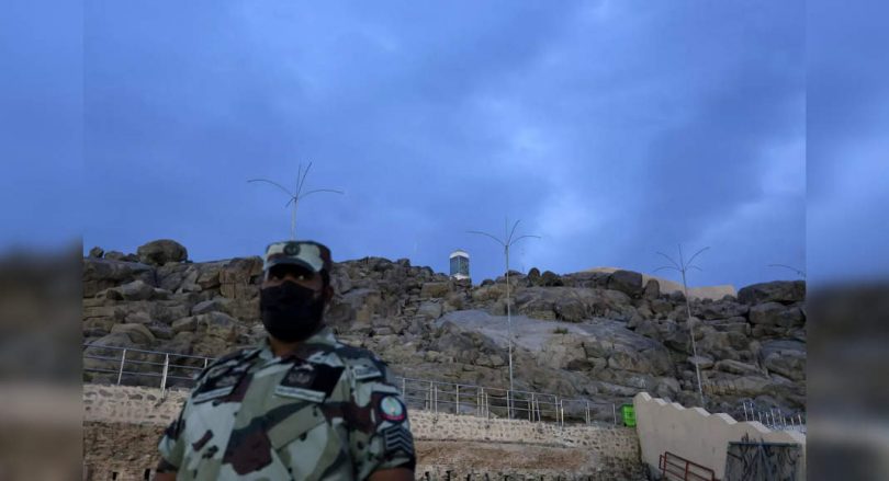 Pilgrims gather to Mount Arafat at the high point of the Hajj era