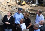 Merkel towards the flood zone facing questions for readiness