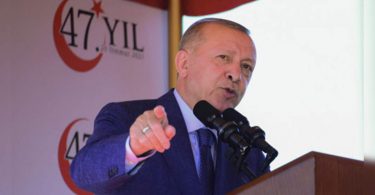 Erdogan pressed hard lines on Cyprus, pushing to reopen the city of ghosts