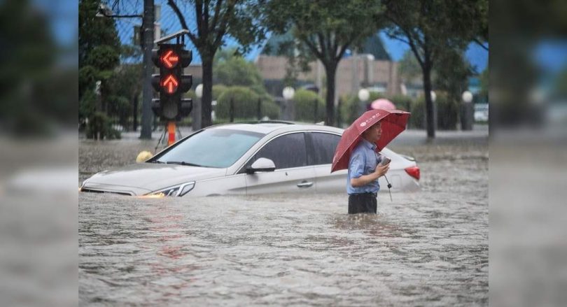 China Blast Dam to divert floods that killed at least 12