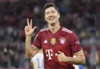 Lewandowski hit a hat-trick to pass 300 goals for Bayern