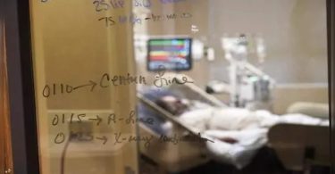 Packed with virus patients, Louisiana Hospital Waiting for IDA