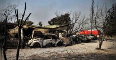 Crews Race containing fire near Athens after thousands of escaping