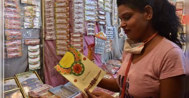 Up: greeting card with rakhis in request