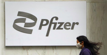Pfizer to require US workers to receive Covid-19 vaccines or regular tests