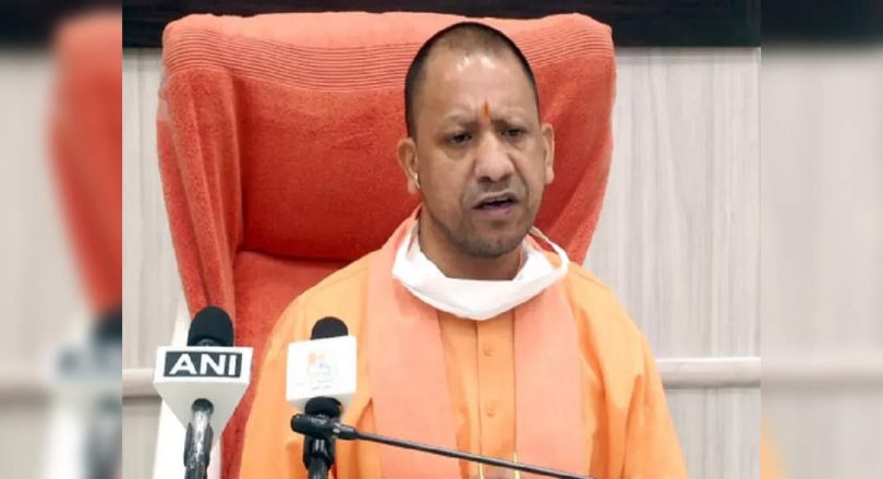 Yogi lifts the sidewalk at the opening of the store on Sunday
