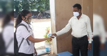 Students return to campus after a long gap; Vibrant but alert.