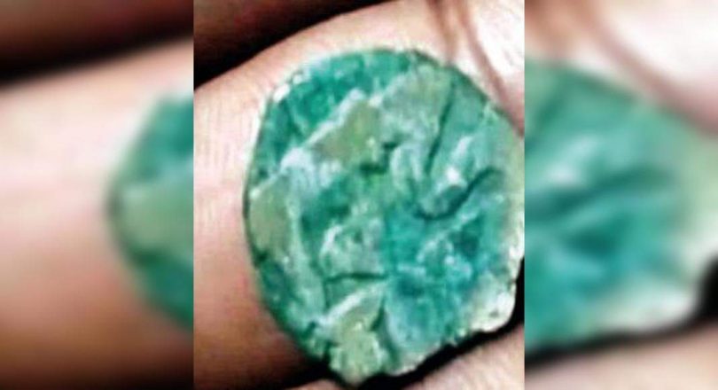 Pitcher is filled with ancient coins found in Kannauj