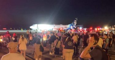 The plane was evacuated after the phone captured the middle API