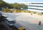 The city school allows bus parking on the campus to help reduce congestion above the proagraj