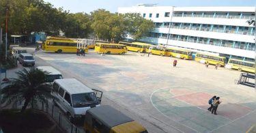 The city school allows bus parking on the campus to help reduce congestion above the proagraj