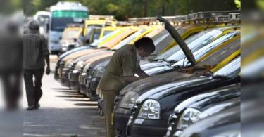 Government, industrial auto czars spar over tax, emissions norm