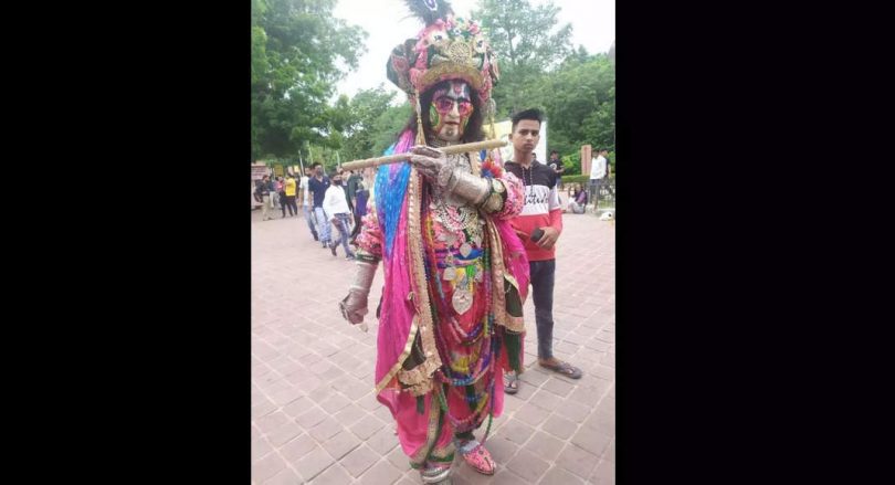 Protests after men dress like Krishna stop at Taj