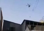 Video: Taliban Flying Chopper with Man Hanging from Rope