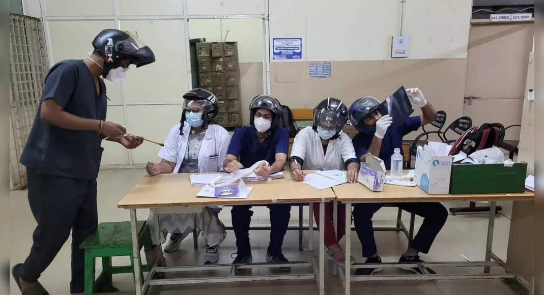 Doctor Hyd wears a helmet on duty in protests